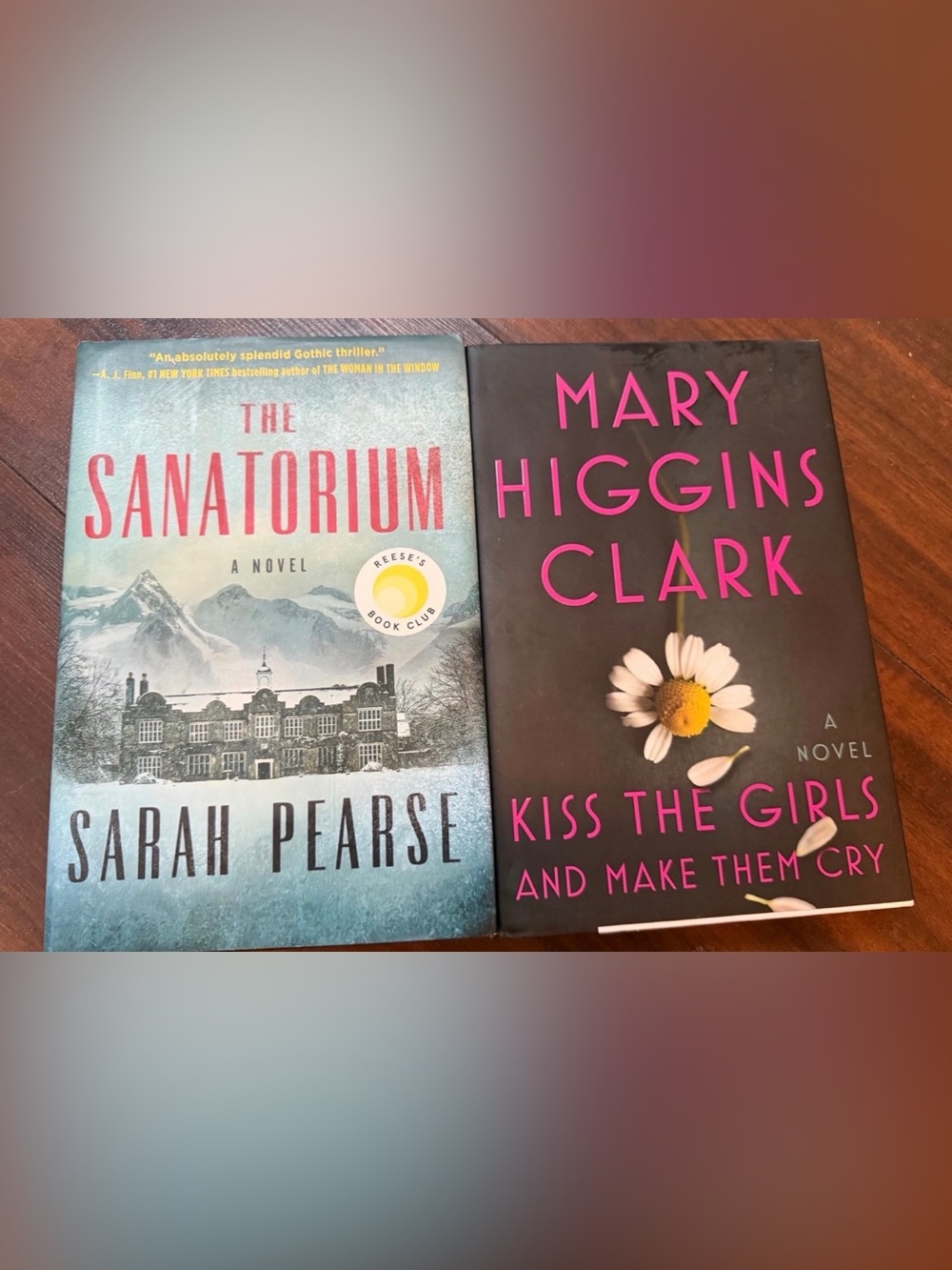 Two hardcover suspense books
